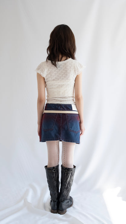 Painted denim mini skirt