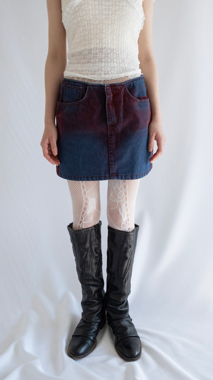 Painted denim mini skirt