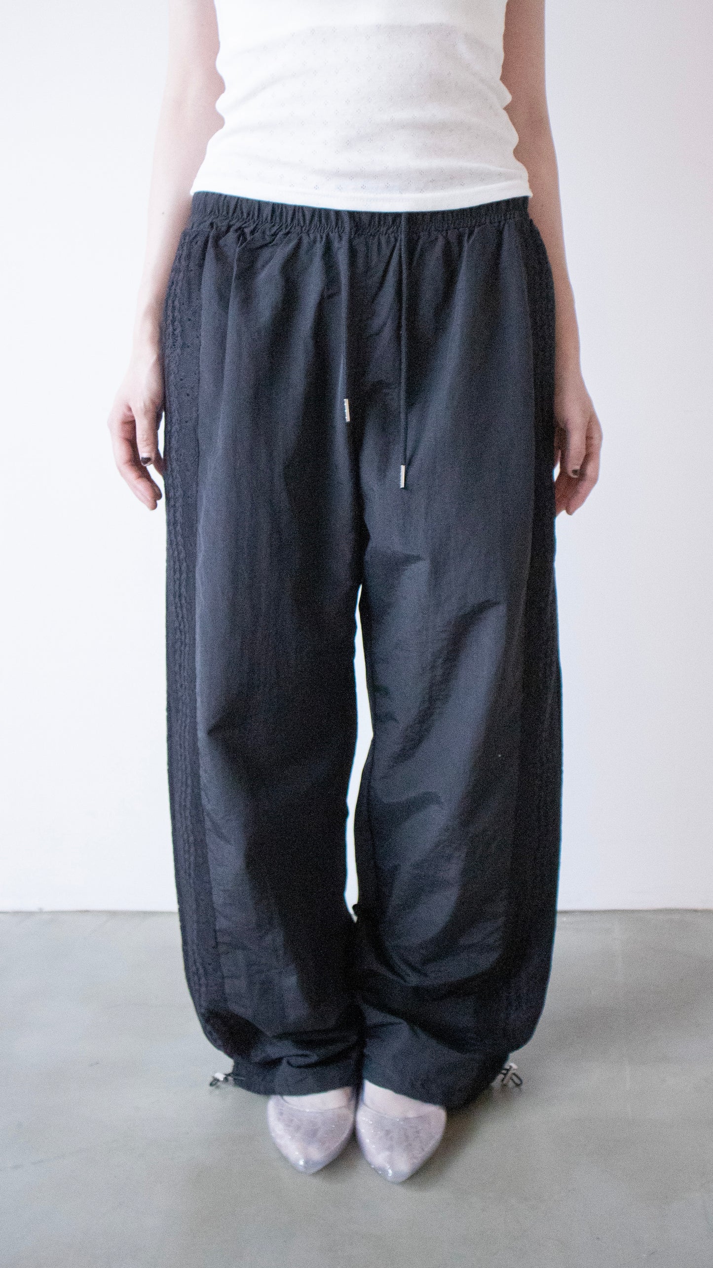 Lace nylon track pants (black)