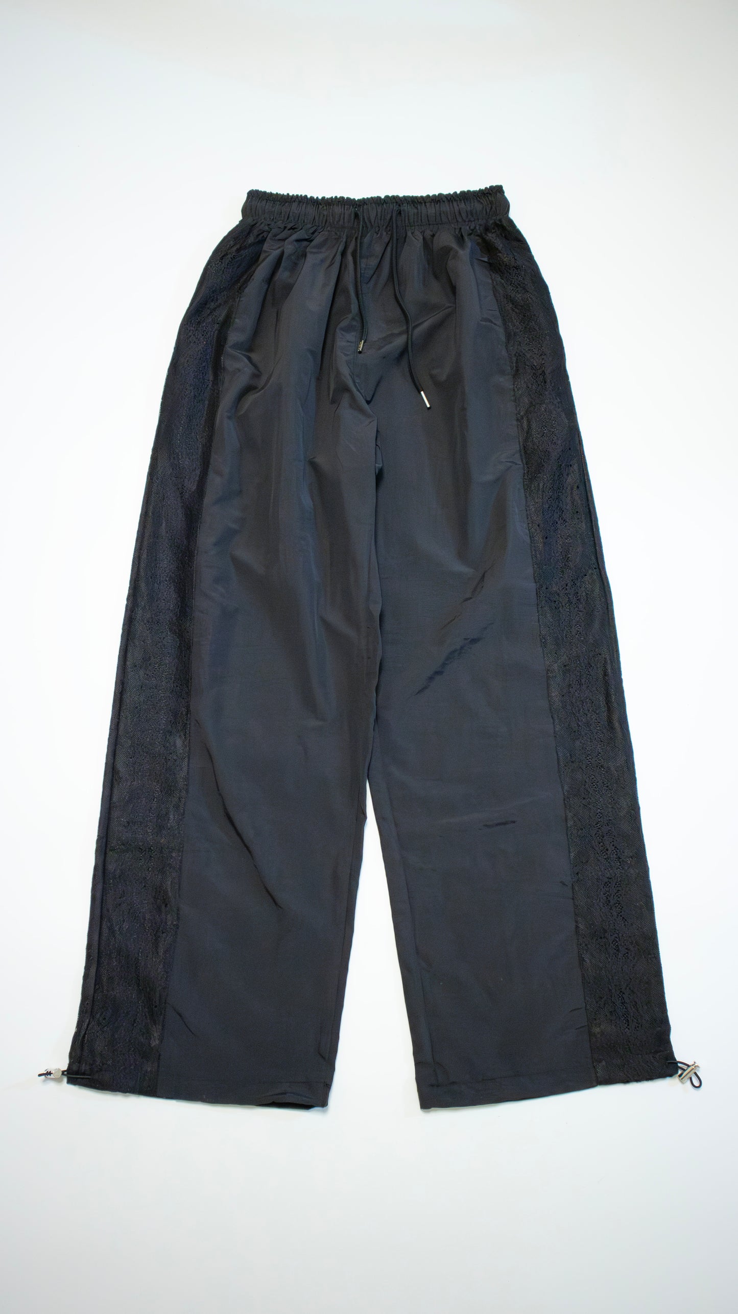 Lace nylon track pants (black)