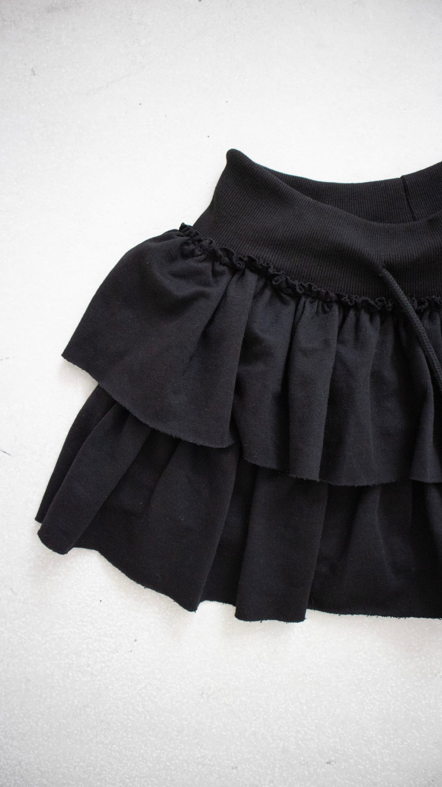 Sweat frill skirt pants (black)