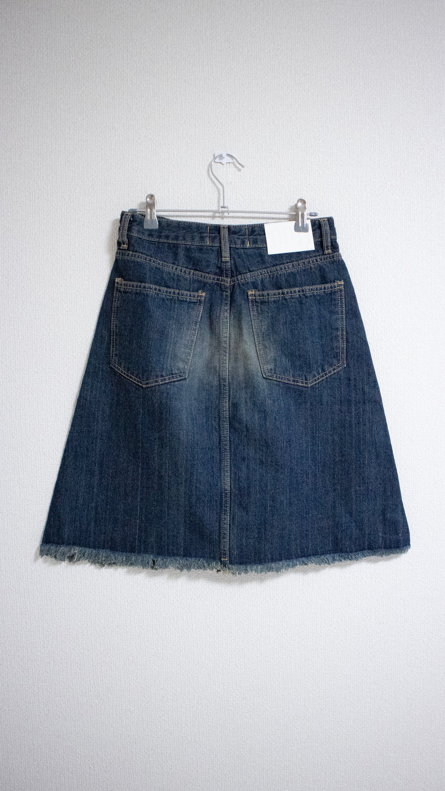 Cut off washed denim skirt