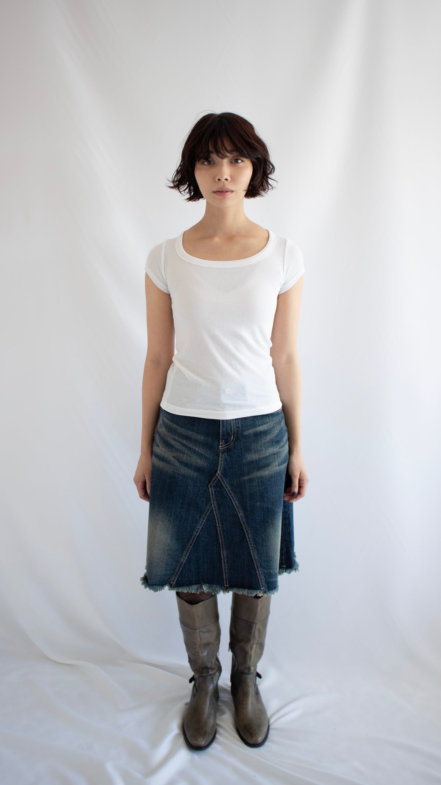 Cut off washed denim skirt