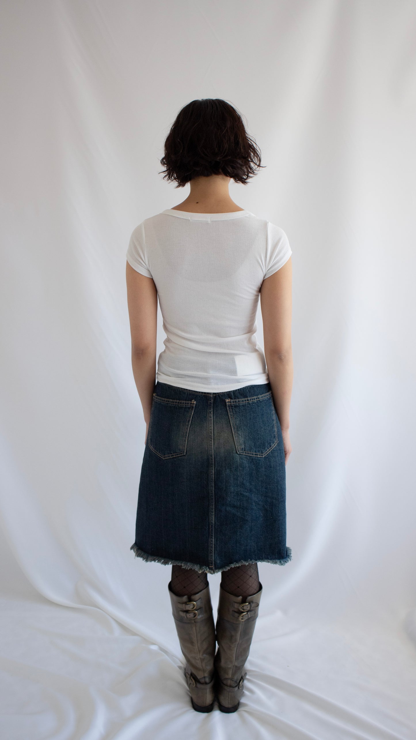 Cut off washed denim skirt